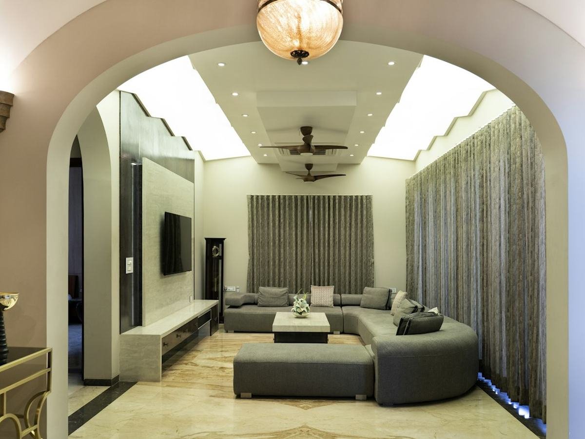 Modern living room with a curved sofa